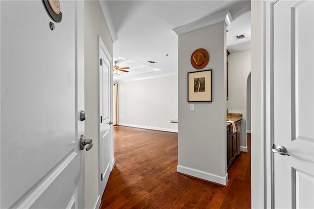 325 E Paces Ferry Rd NE Unit 703, Atlanta, GA 30305 - hallway featuring crown molding, dark wood-style floors, and baseboards