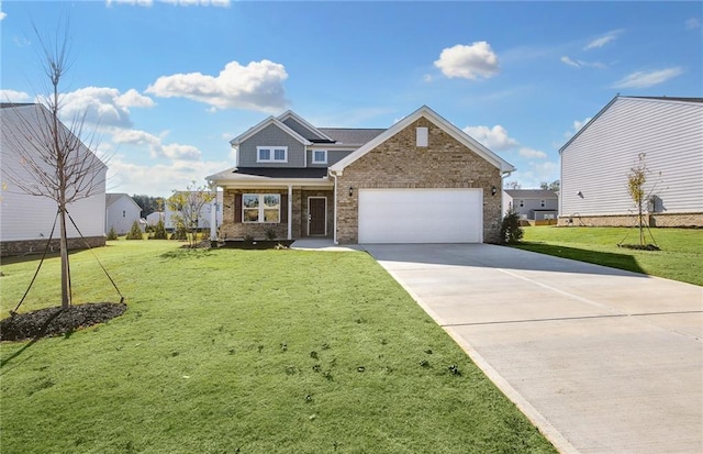 view of front of property featuring a garage and a front yard