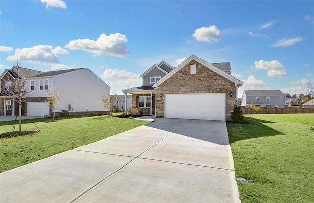 view of front of property featuring a front lawn and a garage