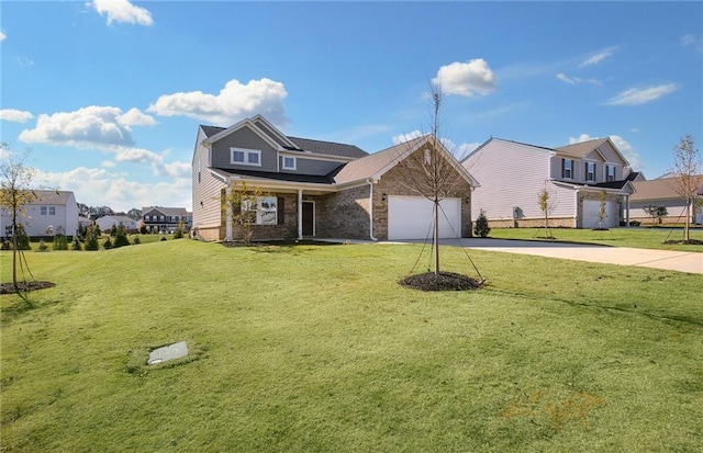 view of front of property with a front lawn and a garage