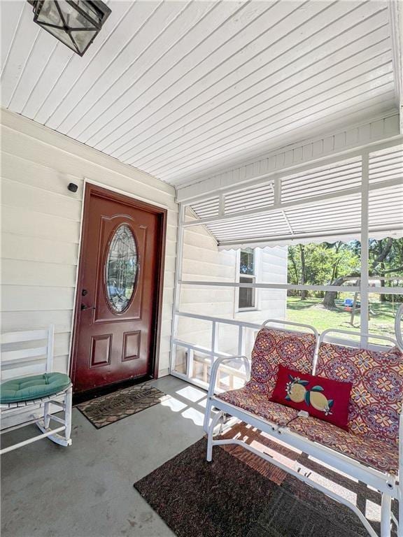 property entrance with a porch