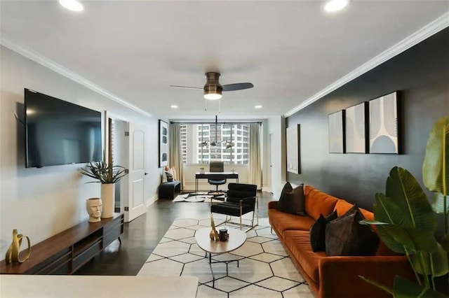 living room featuring ornamental molding and ceiling fan with notable chandelier