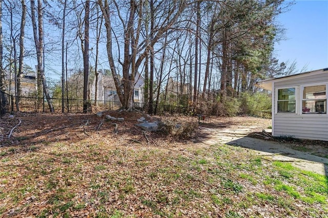 view of yard with fence