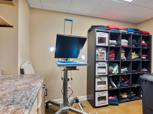 office with a paneled ceiling