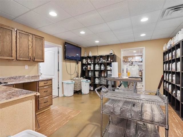 office space featuring a paneled ceiling