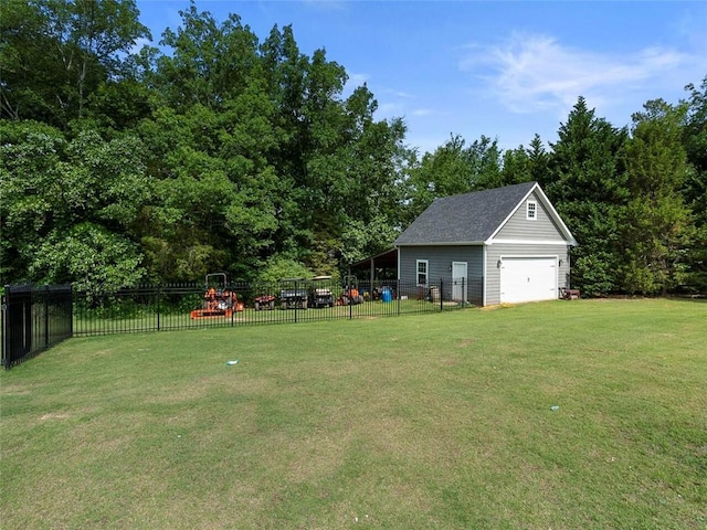 view of yard with an outdoor structure and a garage