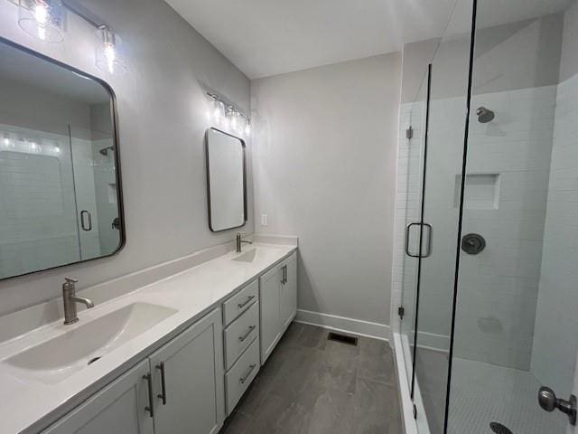 bathroom featuring vanity and walk in shower