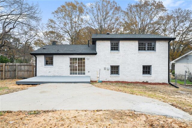 back of house featuring a patio