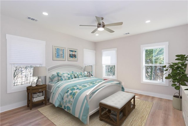 3286 Bachelor St, East Point, GA 30344 - bedroom with multiple windows, wood finished floors, recessed lighting, and ceiling fan
