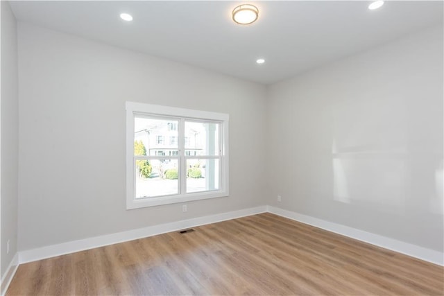 3286 Bachelor St, East Point, GA 30344 - unfurnished room with wood finished floors and recessed lighting