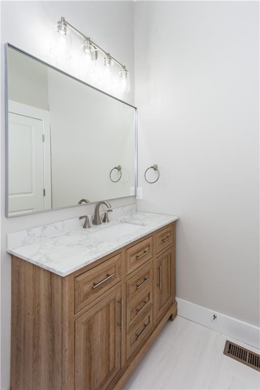 3286 Bachelor St, East Point, GA 30344 - bathroom featuring vanity and marble look tiles