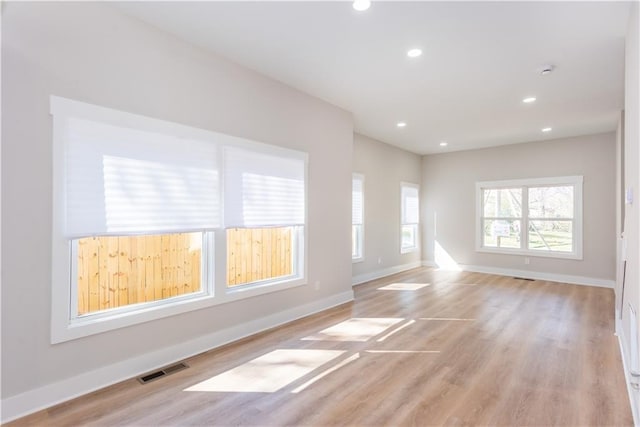 3286 Bachelor St, East Point, GA 30344 - empty room featuring light wood-type flooring, recessed lighting, and a smoke detector