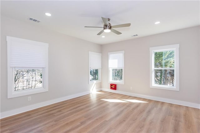 3286 Bachelor St, East Point, GA 30344 - spare room featuring light wood finished floors, a ceiling fan, and recessed lighting