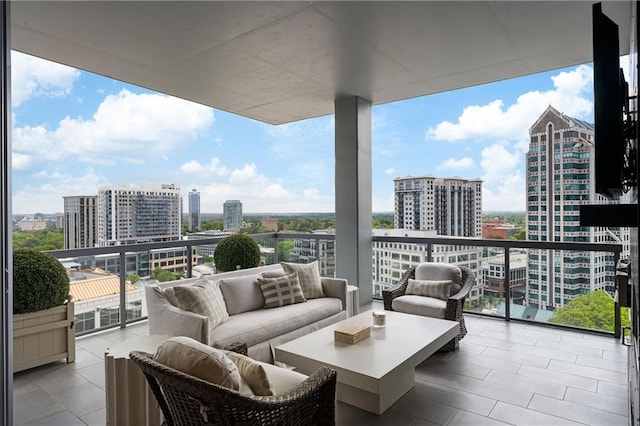 3107 Peachtree Rd NE Unit 1403, Atlanta, GA 30305 - balcony featuring an outdoor living space and a view of city