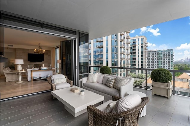 3107 Peachtree Rd NE Unit 1403, Atlanta, GA 30305 - balcony with an outdoor living space and a view of city
