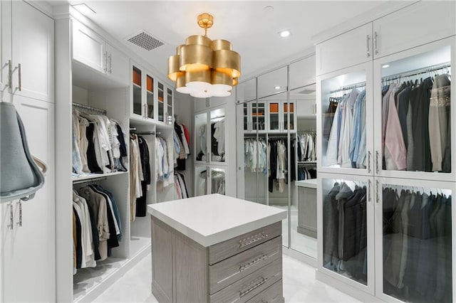 3107 Peachtree Rd NE Unit 1403, Atlanta, GA 30305 - spacious closet with marble finish floor, a notable chandelier, and visible vents