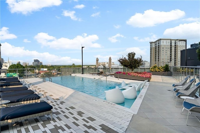 3107 Peachtree Rd NE Unit 1403, Atlanta, GA 30305 - community pool featuring a city view and a patio