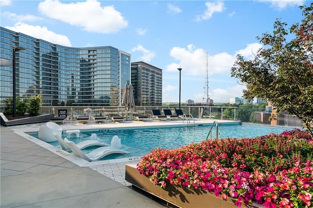 3107 Peachtree Rd NE Unit 1403, Atlanta, GA 30305 - pool with a patio and fence