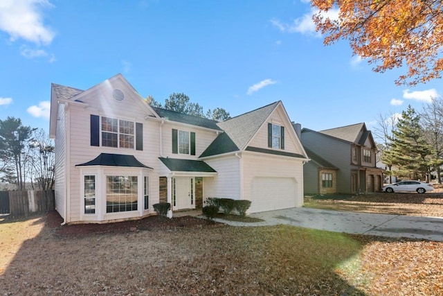 front of property featuring a garage