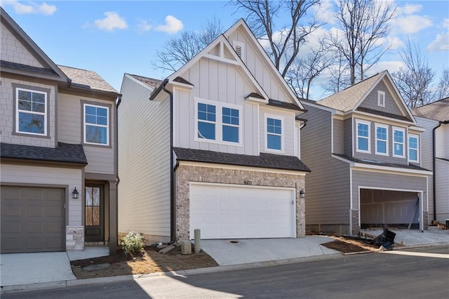 714 Smokey Quartz Way, Kennesaw, GA 30144 - craftsman inspired home featuring board and batten siding, an attached garage, and stone siding