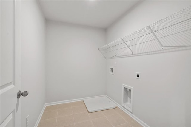 714 Smokey Quartz Way, Kennesaw, GA 30144 - washroom featuring hookup for a washing machine, hookup for an electric dryer, baseboards, and light tile patterned floors