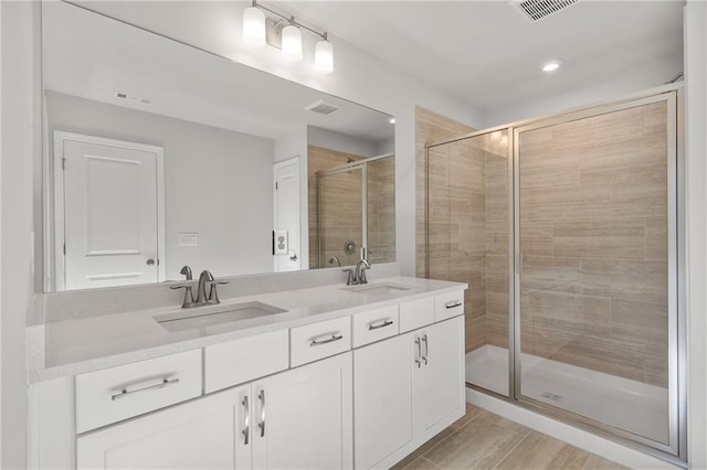 714 Smokey Quartz Way, Kennesaw, GA 30144 - bathroom with a shower stall, double vanity, and recessed lighting