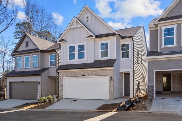 714 Smokey Quartz Way, Kennesaw, GA 30144 - view of front of property with an attached garage, board and batten siding, and concrete driveway