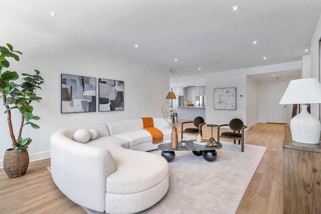 2575 Peachtree Rd NE Unit 6G, Atlanta, GA 30305 - living area with light wood-style floors, baseboards, and recessed lighting