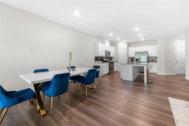 1025 Cherryfield Run, Marietta, GA 30008 - dining area with wood finished floors, recessed lighting, and baseboards