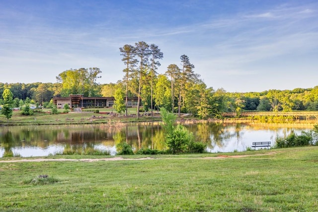 water view featuring a wooded view