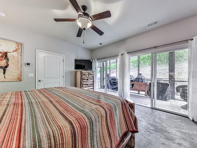 carpeted bedroom with ceiling fan, access to exterior, and multiple windows