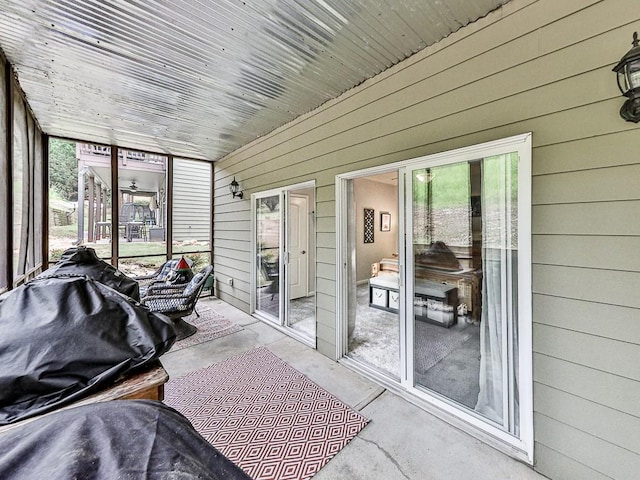 sunroom with wooden ceiling