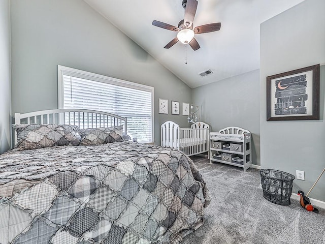 carpeted bedroom with high vaulted ceiling and ceiling fan