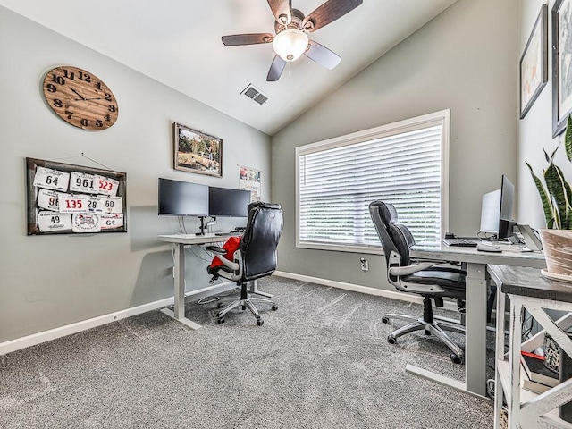 carpeted office space featuring ceiling fan and lofted ceiling