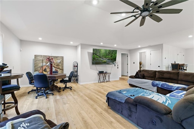 living area featuring baseboards, ceiling fan, recessed lighting, and wood finished floors