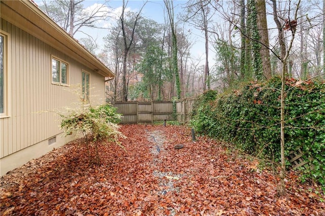 view of yard featuring fence