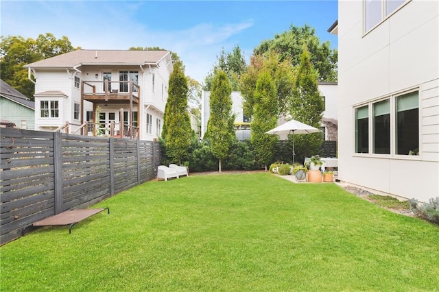 view of yard with a fenced backyard