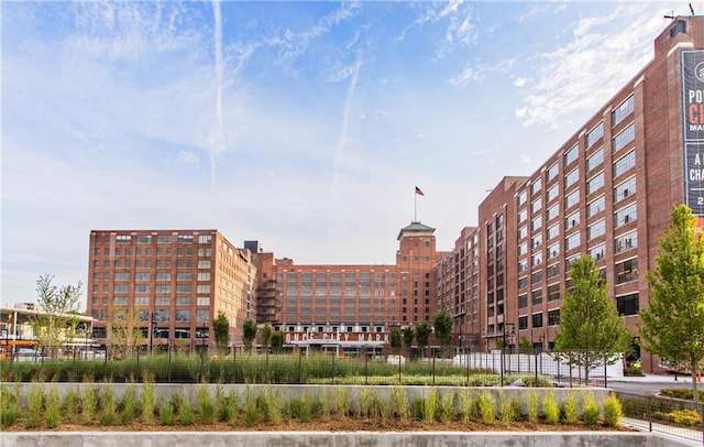 view of building exterior featuring fence