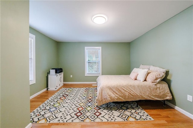 bedroom featuring hardwood / wood-style flooring