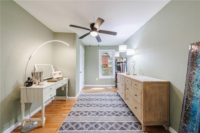 interior space featuring ceiling fan and light wood-type flooring