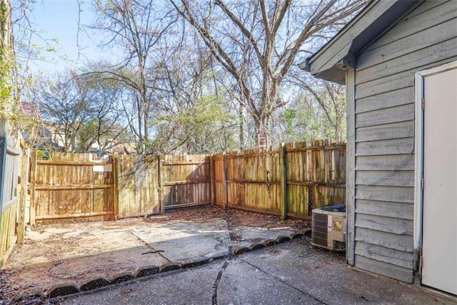 exterior space with a patio, central AC, and fence