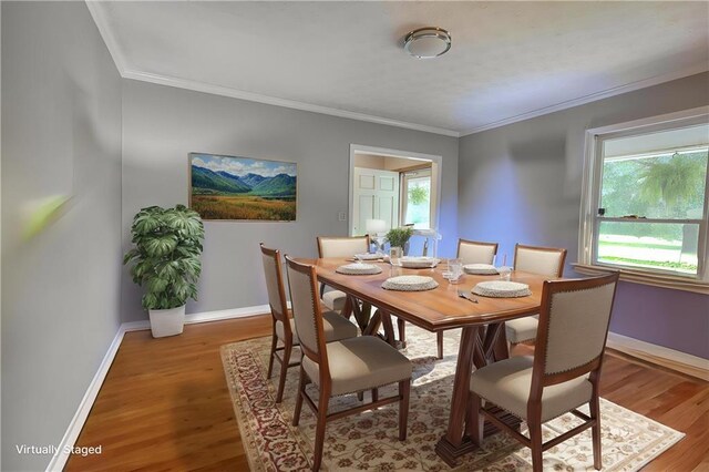 78 N Pomona Rd, Hampton, GA 30228 - dining space featuring light wood-style flooring, baseboards, and crown molding