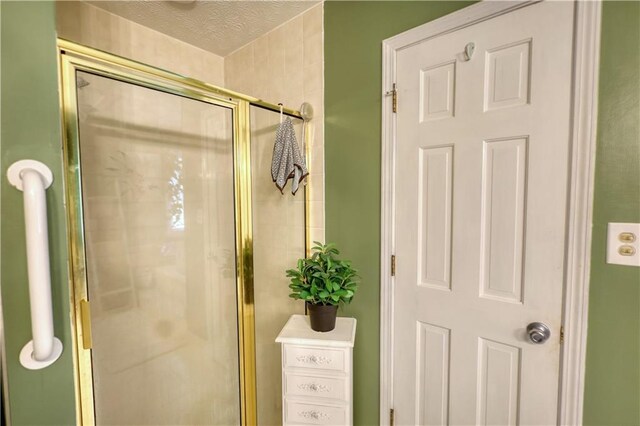 78 N Pomona Rd, Hampton, GA 30228 - full bath featuring a shower stall and a textured ceiling