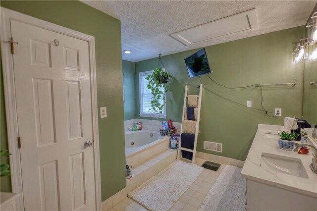 78 N Pomona Rd, Hampton, GA 30228 - bathroom featuring a textured ceiling, double vanity, a whirlpool tub, and baseboards