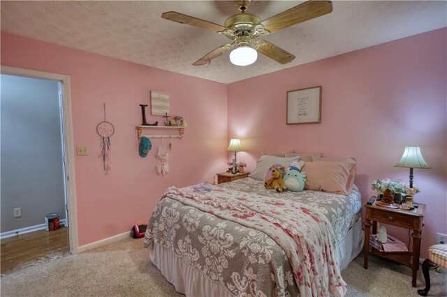 78 N Pomona Rd, Hampton, GA 30228 - carpeted bedroom featuring baseboards and a ceiling fan
