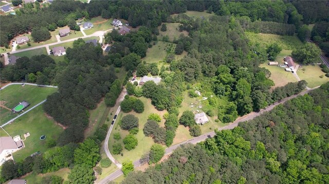 78 N Pomona Rd, Hampton, GA 30228 - aerial overview of property's location featuring a heavily wooded area