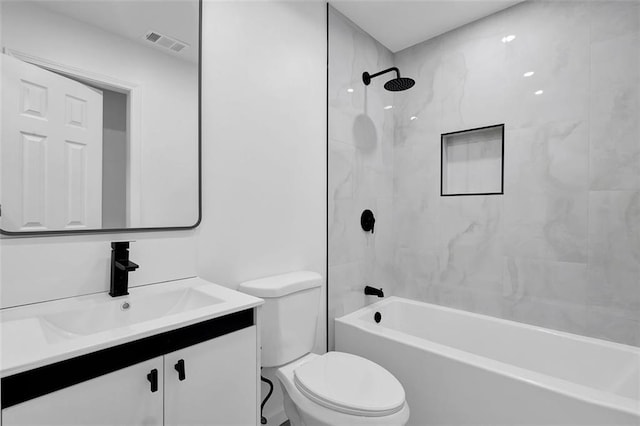 9148 Homewood Dr, Riverdale, GA 30274 - bathroom featuring shower / bath combination, vanity, visible vents, and toilet