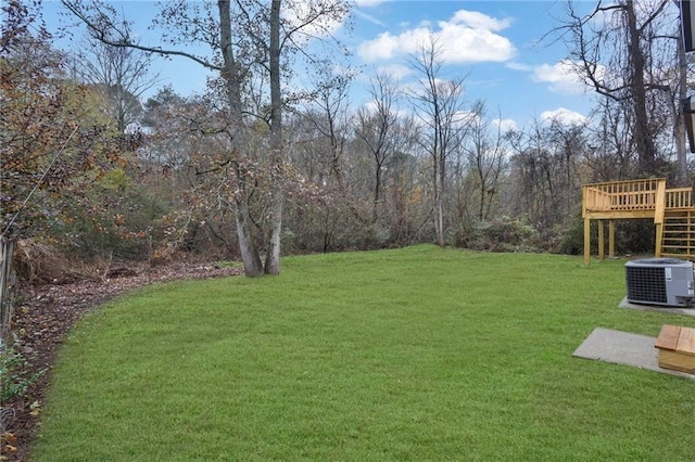9148 Homewood Dr, Riverdale, GA 30274 - view of yard featuring central AC unit and a wooden deck