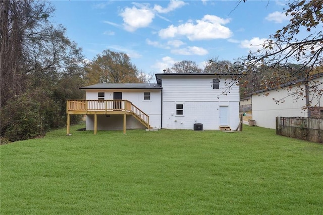 9148 Homewood Dr, Riverdale, GA 30274 - rear view of property with central AC unit, stairway, a deck, and a lawn
