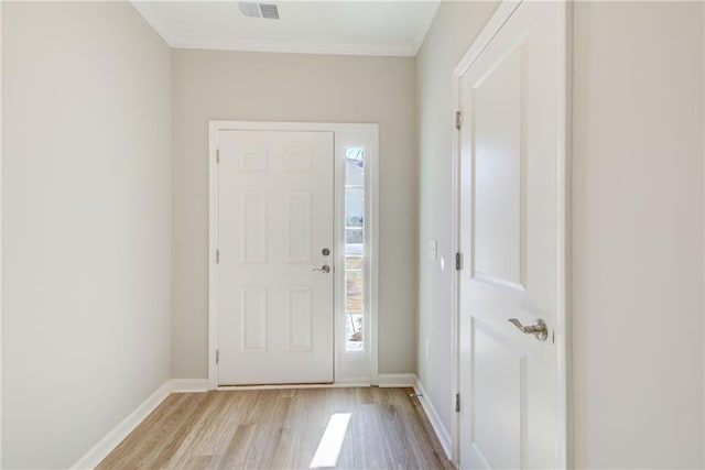 unfurnished living room with light wood-type flooring, ceiling fan, and ornamental molding